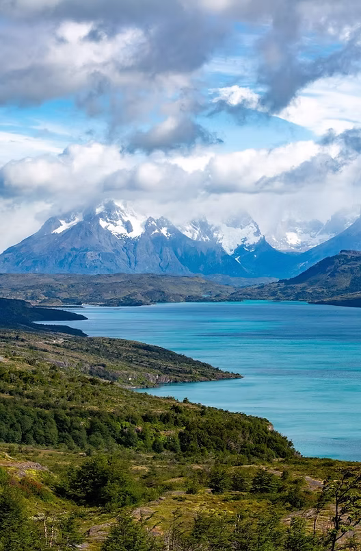 A view of the mountains and water from above.
